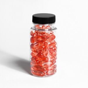glass medication bottle with purple colored gel pills