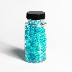 glass medication bottle with teal colored gel pills